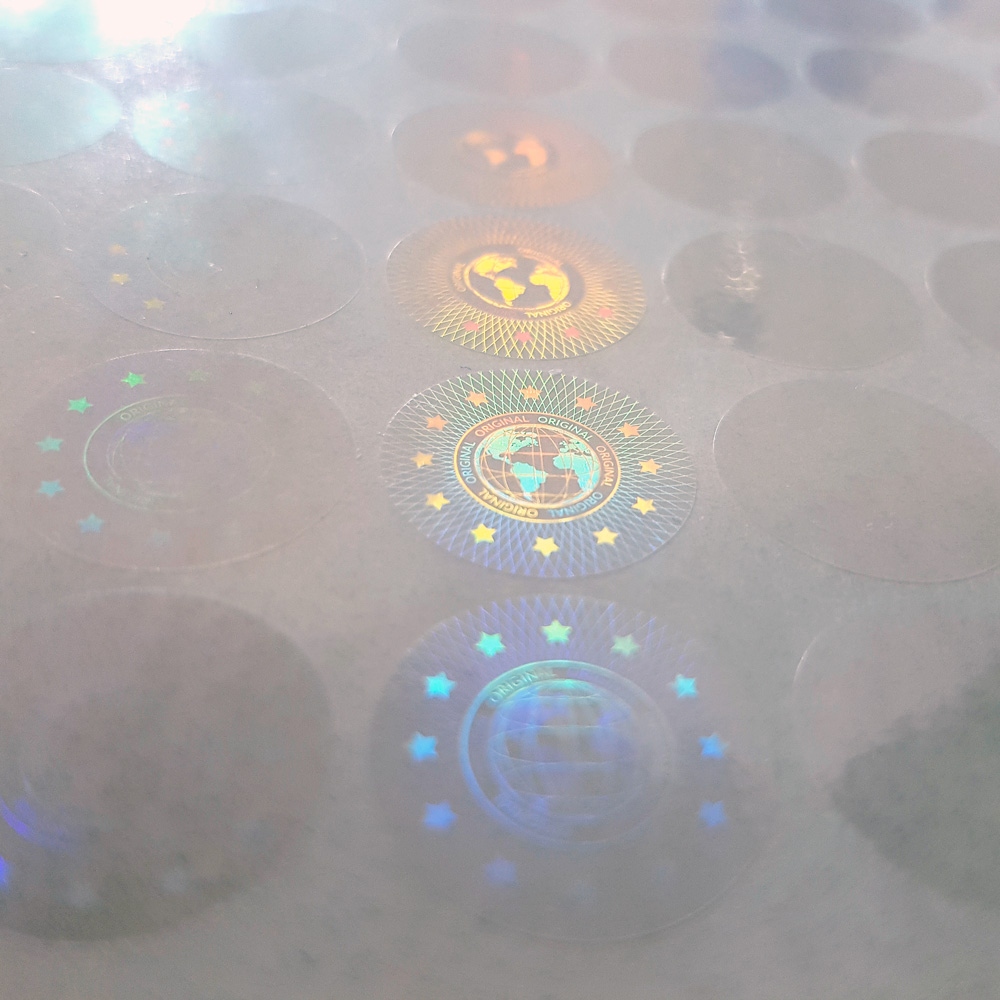 Pegatina holográfica transparente con el motivo de globo, 20mm